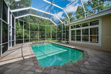 Welcome to luxury living in the desirable Gated, Golf Community on Tarpon Woods Golf Club in Florida - for sale on GolfHomes.com, golf home, golf lot