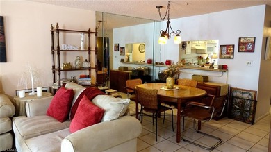 Welcome home to paradise in this fabulous main-level condo on Royal Palm Golf Club in Florida - for sale on GolfHomes.com, golf home, golf lot