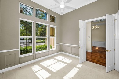 Welcome to luxury living in the desirable Gated, Golf Community on Tarpon Woods Golf Club in Florida - for sale on GolfHomes.com, golf home, golf lot