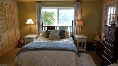 Welcome home to paradise in this fabulous main-level condo on Royal Palm Golf Club in Florida - for sale on GolfHomes.com, golf home, golf lot