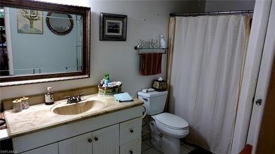 Welcome home to paradise in this fabulous main-level condo on Royal Palm Golf Club in Florida - for sale on GolfHomes.com, golf home, golf lot