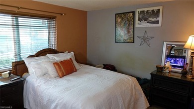 Welcome home to paradise in this fabulous main-level condo on Royal Palm Golf Club in Florida - for sale on GolfHomes.com, golf home, golf lot