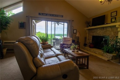 Welcome to your dream retreat in Tan Tar A Estates, an exclusive on The Oaks Golf Course in Missouri - for sale on GolfHomes.com, golf home, golf lot