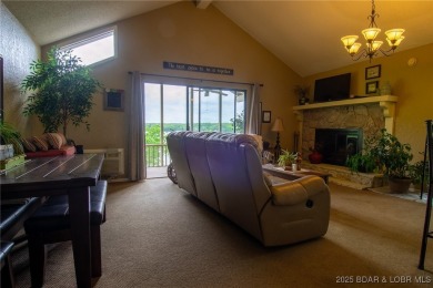 Welcome to your dream retreat in Tan Tar A Estates, an exclusive on The Oaks Golf Course in Missouri - for sale on GolfHomes.com, golf home, golf lot
