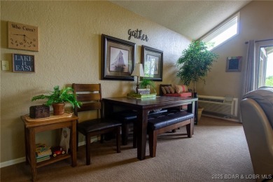 Welcome to your dream retreat in Tan Tar A Estates, an exclusive on The Oaks Golf Course in Missouri - for sale on GolfHomes.com, golf home, golf lot