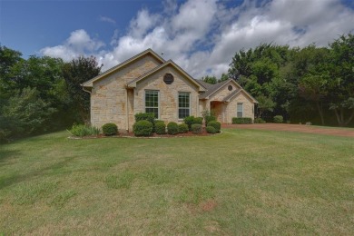 Beautiful Austin Stone home on the golf course, located in the on White Bluff Resort - New Course in Texas - for sale on GolfHomes.com, golf home, golf lot