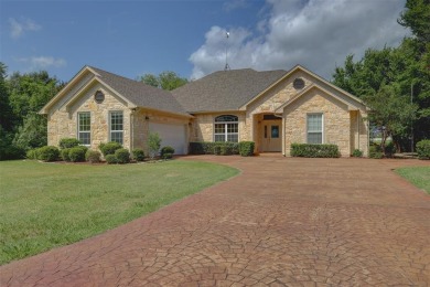 Beautiful Austin Stone home on the golf course, located in the on White Bluff Resort - New Course in Texas - for sale on GolfHomes.com, golf home, golf lot