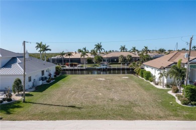 PUNTA GORDA ISLES WATERFRONT LOT - Vacant lot in PGI w/concrete on Saint Andrews South Golf Club in Florida - for sale on GolfHomes.com, golf home, golf lot