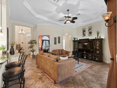 IMPROVED PRICE--An iconic palm tree and elegant paver driveway on Harbor Hills Country Club in Florida - for sale on GolfHomes.com, golf home, golf lot