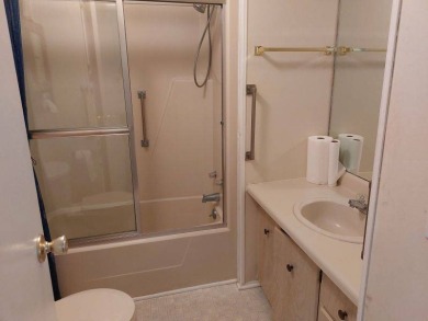 Lot Rent is $1,185.00 monthly. This is a 2-bedroom 2 bath on Lake Fairways Country Club in Florida - for sale on GolfHomes.com, golf home, golf lot