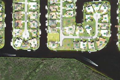 PUNTA GORDA ISLES WATERFRONT LOT - Vacant lot in PGI w/concrete on Saint Andrews South Golf Club in Florida - for sale on GolfHomes.com, golf home, golf lot