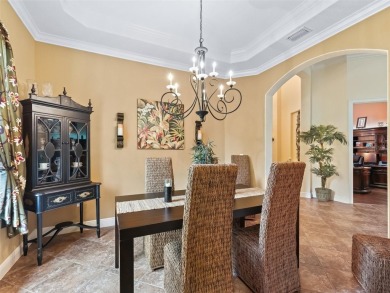 IMPROVED PRICE--An iconic palm tree and elegant paver driveway on Harbor Hills Country Club in Florida - for sale on GolfHomes.com, golf home, golf lot