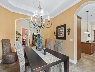 IMPROVED PRICE--An iconic palm tree and elegant paver driveway on Harbor Hills Country Club in Florida - for sale on GolfHomes.com, golf home, golf lot