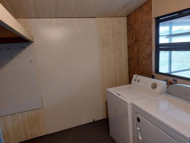Lot Rent is $1,185.00 monthly. This is a 2-bedroom 2 bath on Lake Fairways Country Club in Florida - for sale on GolfHomes.com, golf home, golf lot