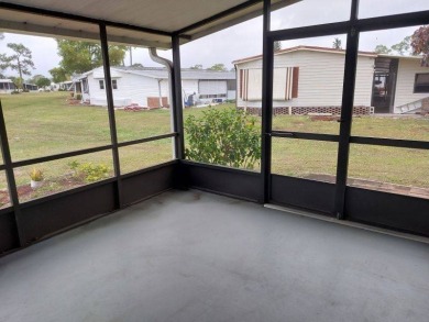 Lot Rent is $1,185.00 monthly. This is a 2-bedroom 2 bath on Lake Fairways Country Club in Florida - for sale on GolfHomes.com, golf home, golf lot