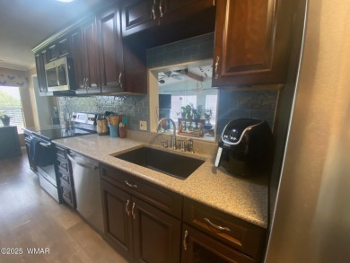 This spacious home is located on the golf course surrounded on on Juniper Ridge R.V. Golf Resort in Arizona - for sale on GolfHomes.com, golf home, golf lot