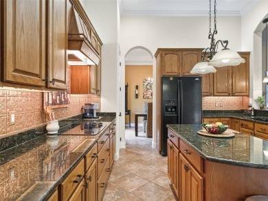 IMPROVED PRICE--An iconic palm tree and elegant paver driveway on Harbor Hills Country Club in Florida - for sale on GolfHomes.com, golf home, golf lot