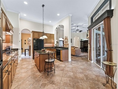 IMPROVED PRICE--An iconic palm tree and elegant paver driveway on Harbor Hills Country Club in Florida - for sale on GolfHomes.com, golf home, golf lot