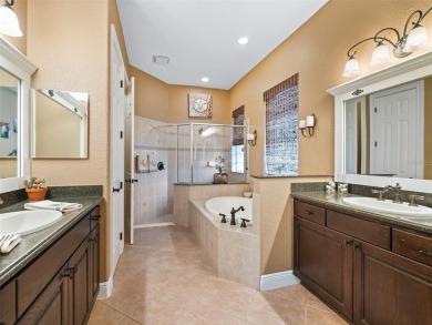IMPROVED PRICE--An iconic palm tree and elegant paver driveway on Harbor Hills Country Club in Florida - for sale on GolfHomes.com, golf home, golf lot