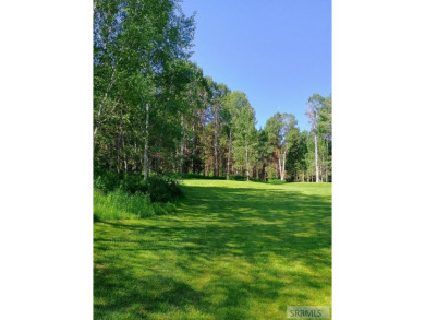 Beautiful wooded lot on the 3rd green of the Timberline Golf on Timberline Golf Course in Idaho - for sale on GolfHomes.com, golf home, golf lot