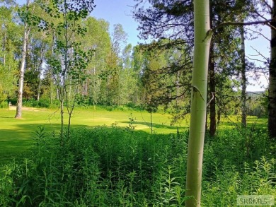 Beautiful wooded lot on the 3rd green of the Timberline Golf on Timberline Golf Course in Idaho - for sale on GolfHomes.com, golf home, golf lot