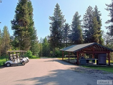 Beautiful wooded lot on the 3rd green of the Timberline Golf on Timberline Golf Course in Idaho - for sale on GolfHomes.com, golf home, golf lot