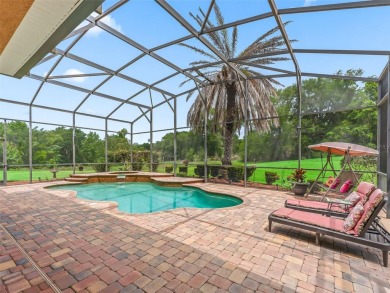 IMPROVED PRICE--An iconic palm tree and elegant paver driveway on Harbor Hills Country Club in Florida - for sale on GolfHomes.com, golf home, golf lot