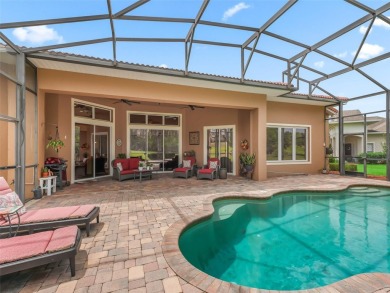 IMPROVED PRICE--An iconic palm tree and elegant paver driveway on Harbor Hills Country Club in Florida - for sale on GolfHomes.com, golf home, golf lot