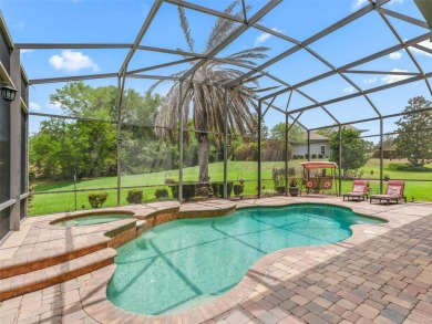 IMPROVED PRICE--An iconic palm tree and elegant paver driveway on Harbor Hills Country Club in Florida - for sale on GolfHomes.com, golf home, golf lot