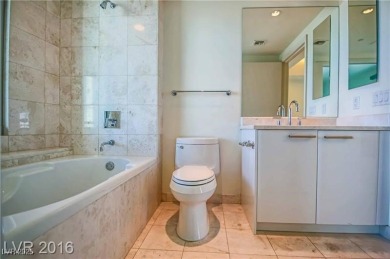 BEST PRICED HIGH FLOOR RESIDENCE w/ PHENOMENAL VIEWS OF THE on Las Vegas Country Club in Nevada - for sale on GolfHomes.com, golf home, golf lot