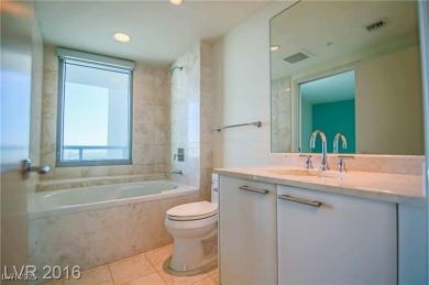 BEST PRICED HIGH FLOOR RESIDENCE w/ PHENOMENAL VIEWS OF THE on Las Vegas Country Club in Nevada - for sale on GolfHomes.com, golf home, golf lot