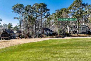 Nestled on a beautiful golf lot overlooking the seventh fairway on Reynolds Lake Oconee - The Oconee in Georgia - for sale on GolfHomes.com, golf home, golf lot