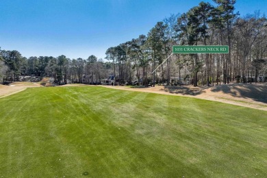 Nestled on a beautiful golf lot overlooking the seventh fairway on Reynolds Lake Oconee - The Oconee in Georgia - for sale on GolfHomes.com, golf home, golf lot