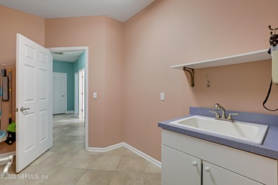 **GATED GOLF COMMUNITY**HUGE LOT**UPDATED** Discover elegance on Cimarrone Golf and Country Club in Florida - for sale on GolfHomes.com, golf home, golf lot