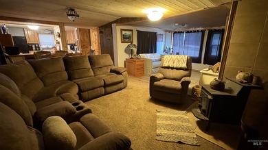 Completely renovated mobile home with cedar siding at Terrace on Terrace Lakes Golf Resort in Idaho - for sale on GolfHomes.com, golf home, golf lot