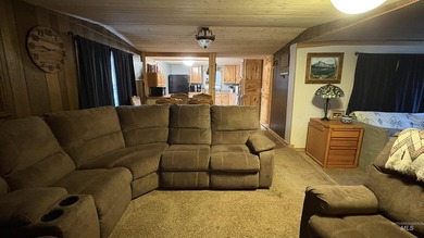 Completely renovated mobile home with cedar siding at Terrace on Terrace Lakes Golf Resort in Idaho - for sale on GolfHomes.com, golf home, golf lot