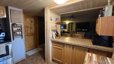 Completely renovated mobile home with cedar siding at Terrace on Terrace Lakes Golf Resort in Idaho - for sale on GolfHomes.com, golf home, golf lot