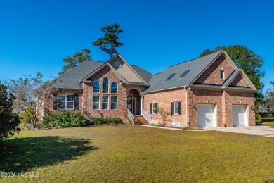 This exquisite custom home is situated on the Azalea 3 Fairway on Brunswick Plantation and Golf Resorts in North Carolina - for sale on GolfHomes.com, golf home, golf lot