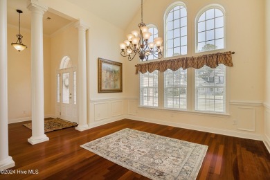 This exquisite custom home is situated on the Azalea 3 Fairway on Brunswick Plantation and Golf Resorts in North Carolina - for sale on GolfHomes.com, golf home, golf lot