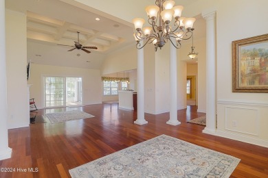 This exquisite custom home is situated on the Azalea 3 Fairway on Brunswick Plantation and Golf Resorts in North Carolina - for sale on GolfHomes.com, golf home, golf lot