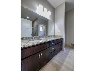 This stunning 4-bed, 3-bath ranch in Romeo offers 1,900 sq. ft on The Glacier Club in Michigan - for sale on GolfHomes.com, golf home, golf lot