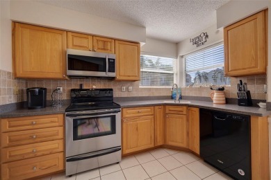 NO FLOOD INSURANCE REQUIRED! DID NOT FLOOD DURING 2024 STORMS! on Isla Del Sol Yacht and Country Club in Florida - for sale on GolfHomes.com, golf home, golf lot