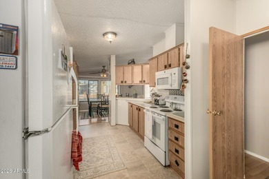 This beautifully maintained, fully furnished home features a on 3 Parks Fairways in Arizona - for sale on GolfHomes.com, golf home, golf lot