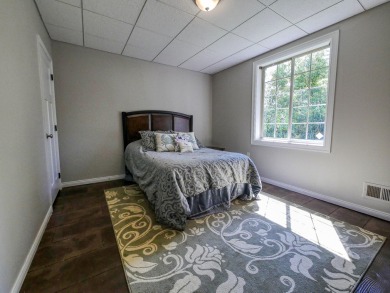 This stunning 4-bed, 3-bath ranch in Romeo offers 1,900 sq. ft on The Glacier Club in Michigan - for sale on GolfHomes.com, golf home, golf lot
