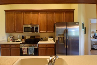 New Roof! Enjoy golf course frontage in this charming 2-bedroom on Tampa Bay Golf and Country Club in Florida - for sale on GolfHomes.com, golf home, golf lot