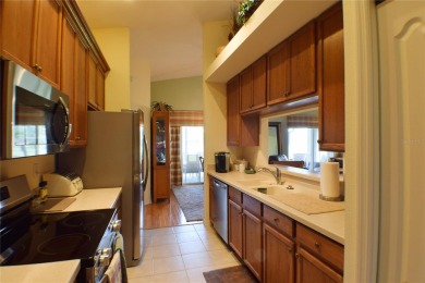 New Roof! Enjoy golf course frontage in this charming 2-bedroom on Tampa Bay Golf and Country Club in Florida - for sale on GolfHomes.com, golf home, golf lot