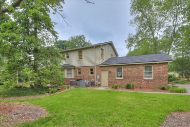 This traditional brick home is located in the desirable on Houndslake Country Club in South Carolina - for sale on GolfHomes.com, golf home, golf lot