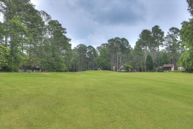 This traditional brick home is located in the desirable on Houndslake Country Club in South Carolina - for sale on GolfHomes.com, golf home, golf lot