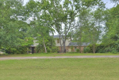 This traditional brick home is located in the desirable on Houndslake Country Club in South Carolina - for sale on GolfHomes.com, golf home, golf lot