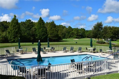 New Roof! Enjoy golf course frontage in this charming 2-bedroom on Tampa Bay Golf and Country Club in Florida - for sale on GolfHomes.com, golf home, golf lot